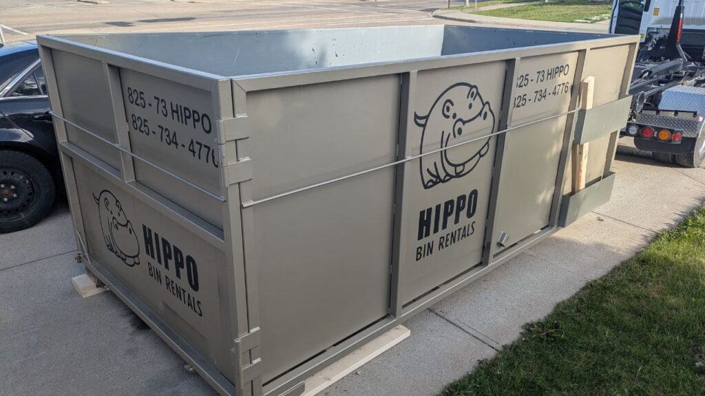 Hippo Bins Airdrie Dumpster Rentals in driveway